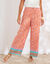 Pantalon large imprimé, taille haute smockée (orange)