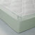 Drap-housse uni jersey bonnets 26 cm (vert amande)