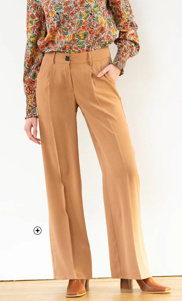 Pantalon large noir fluide – un indispensable pour apprendre comment porter le pantalon large de manière intemporelle et élégante